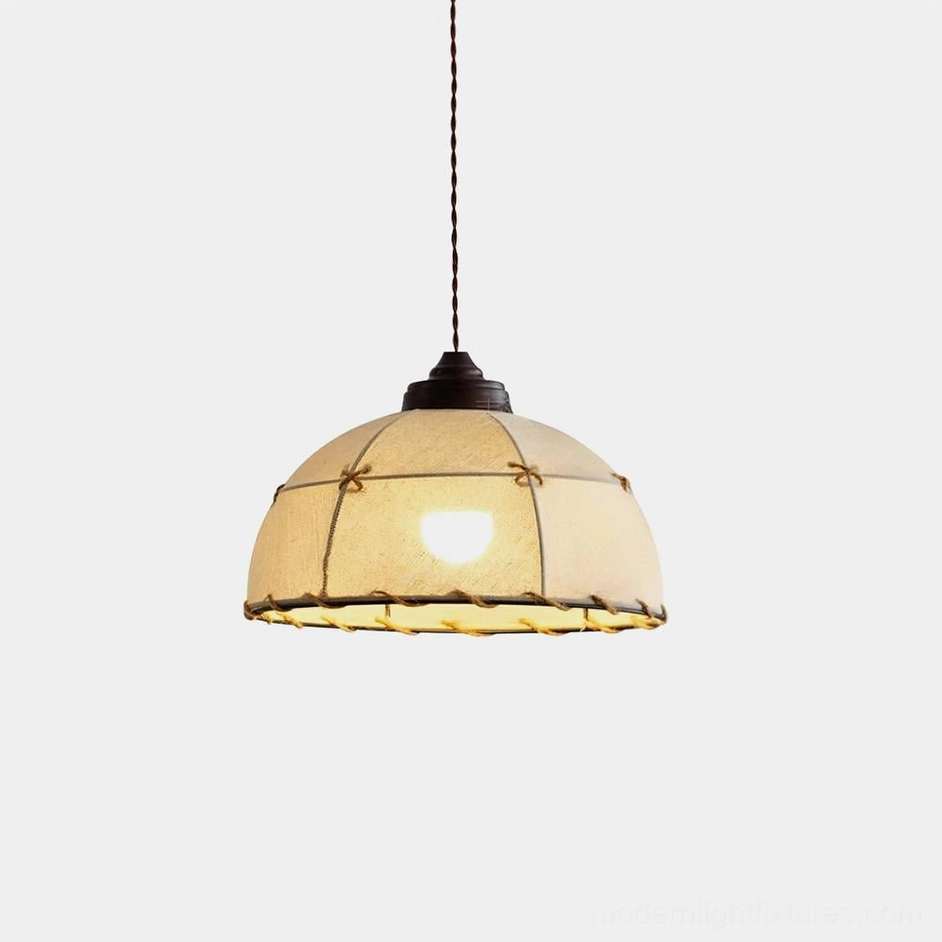 Handcrafted Dome Jari fabric pendant light with braided rope trim, front view on white studio background showing hemispherical beige canvas shade with geometric grid pattern and dark metal fixture