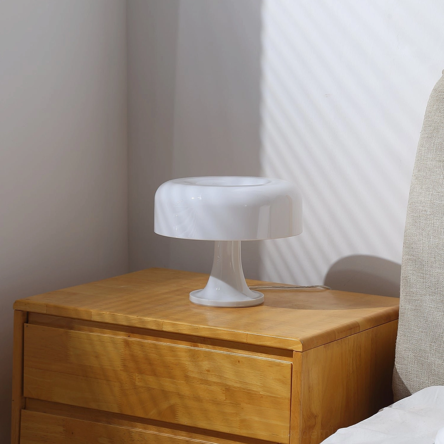 Donula sculptural table lamp in pure white finish for contemporary minimalist spaces