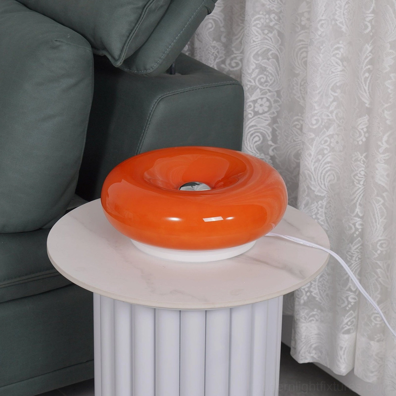 Warm orange donut lamp nostalgic mid-century charm versatile home lighting solution