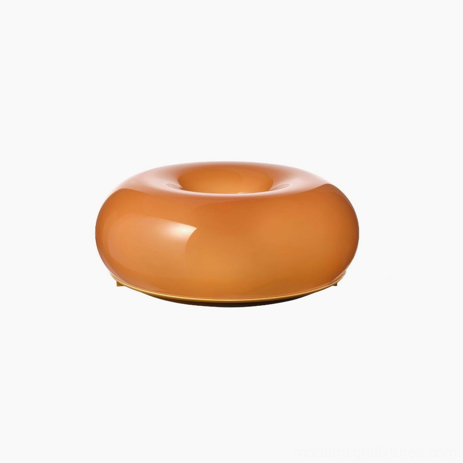 Donut table lamp touch-activated switch control on warm orange glossy glass surface