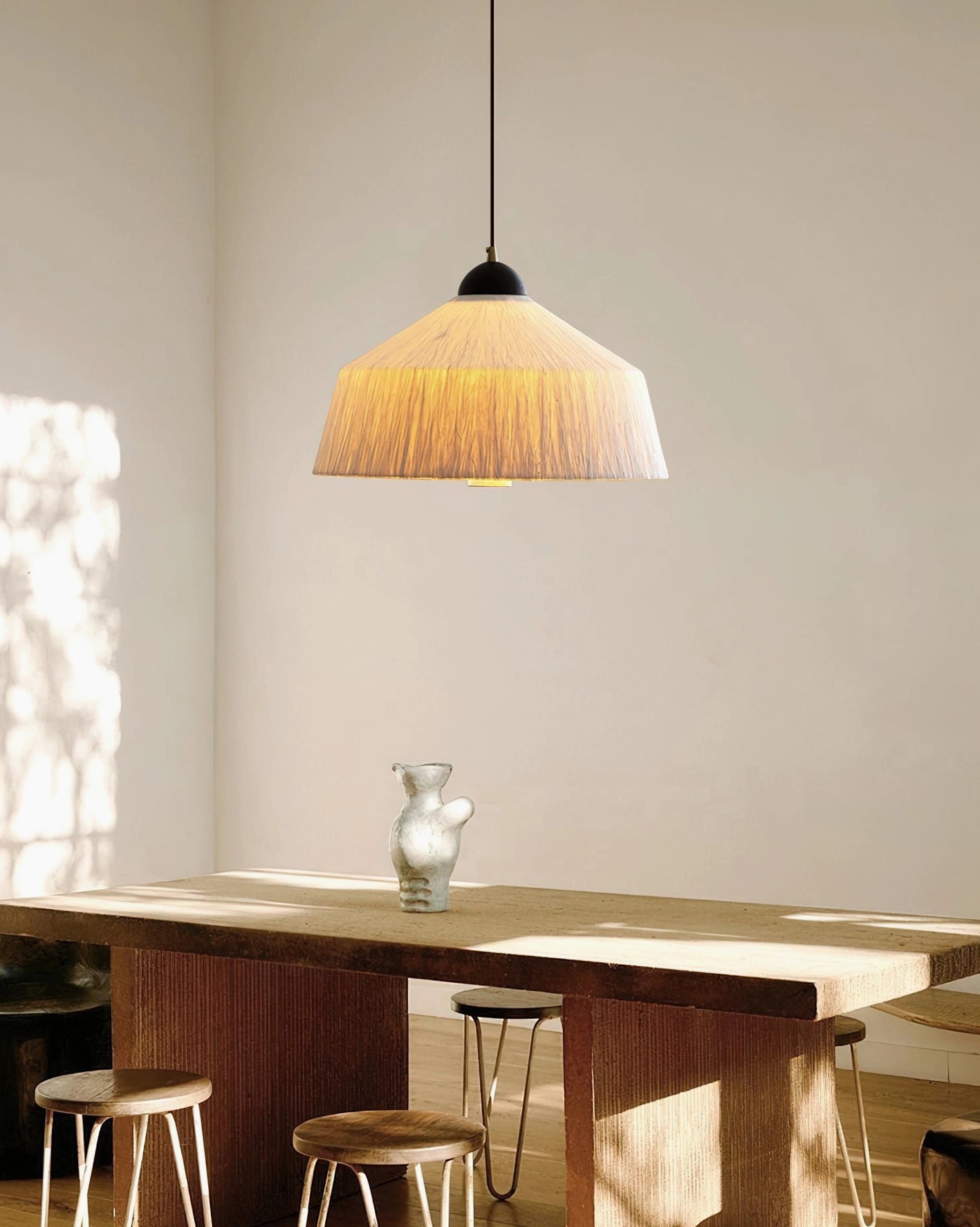 Multiple Doria pendant lights in contemporary interior, group installation warm white ambient lighting