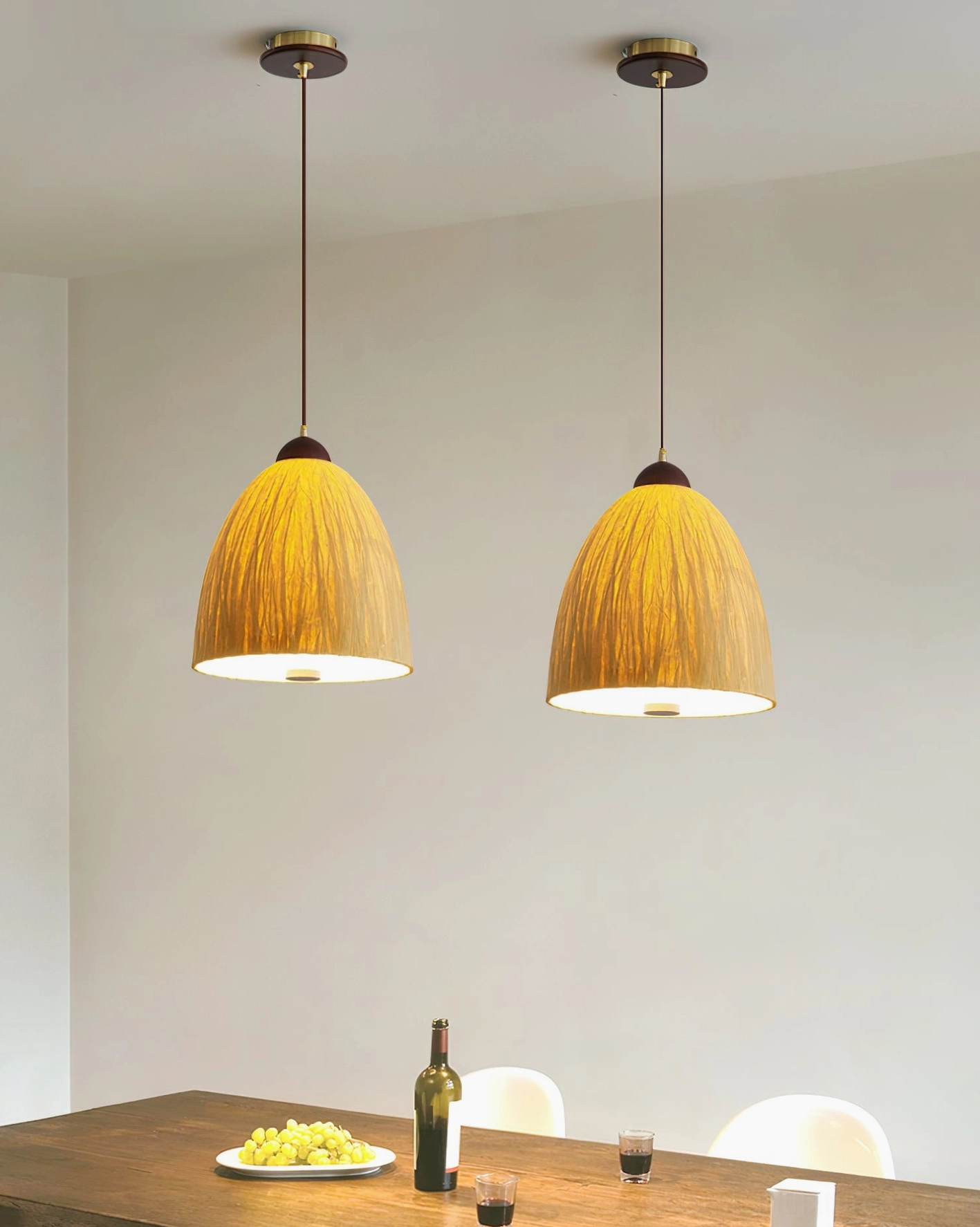 Doria pendant light detail of wood and gold hardware accents, premium material construction closeup