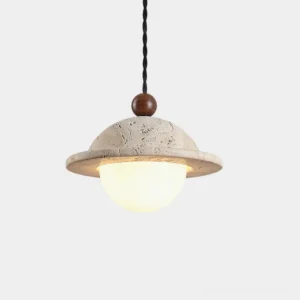 Dorna travertine pendant light illuminated from front, showing frosted dome shade and twisted textile cord