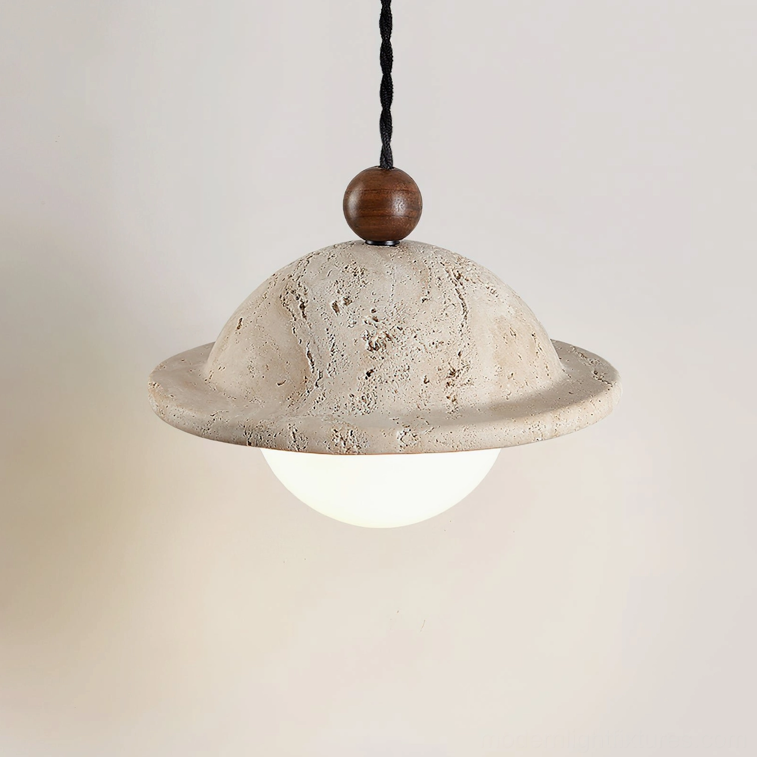 Dorna sculptural pendant light side profile with soft ambient glow and walnut accent