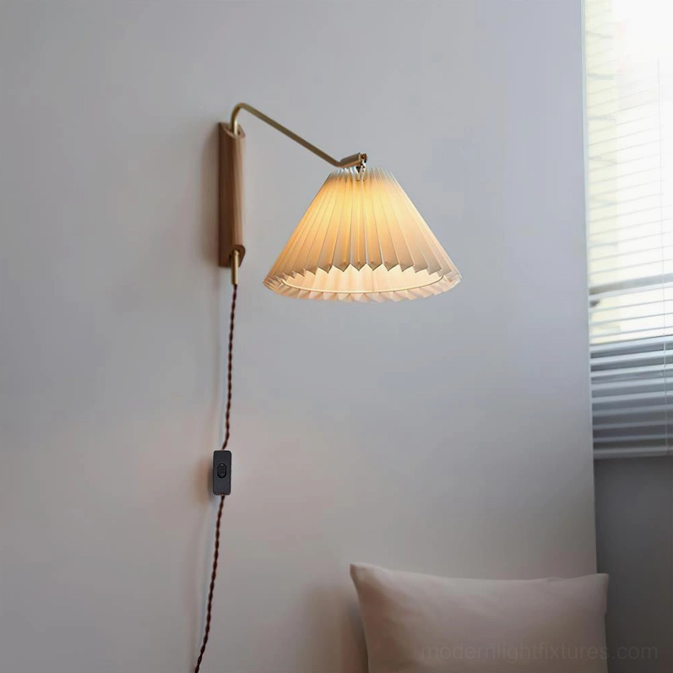 Dorset wall sconce in natural wood finish showing warm material and design detail