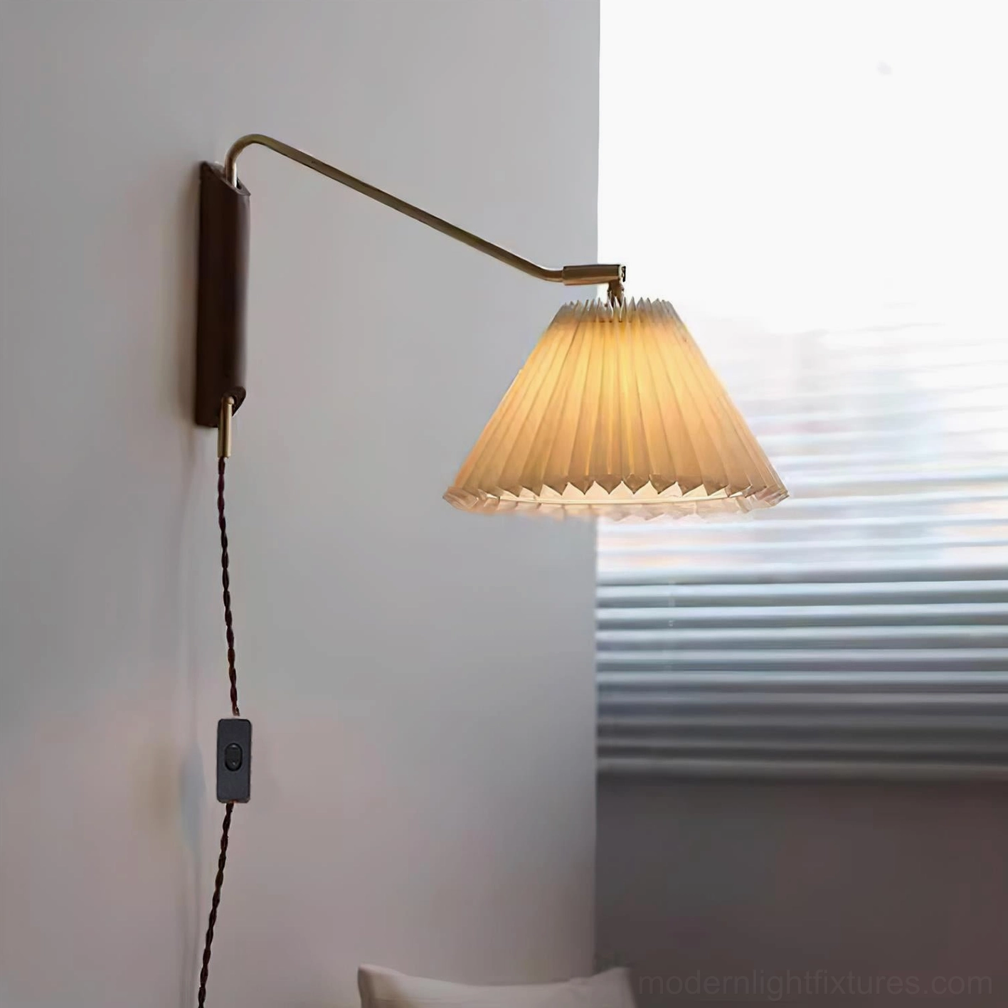 Dorset pleated shade wall sconce creating soft wall wash lighting effect