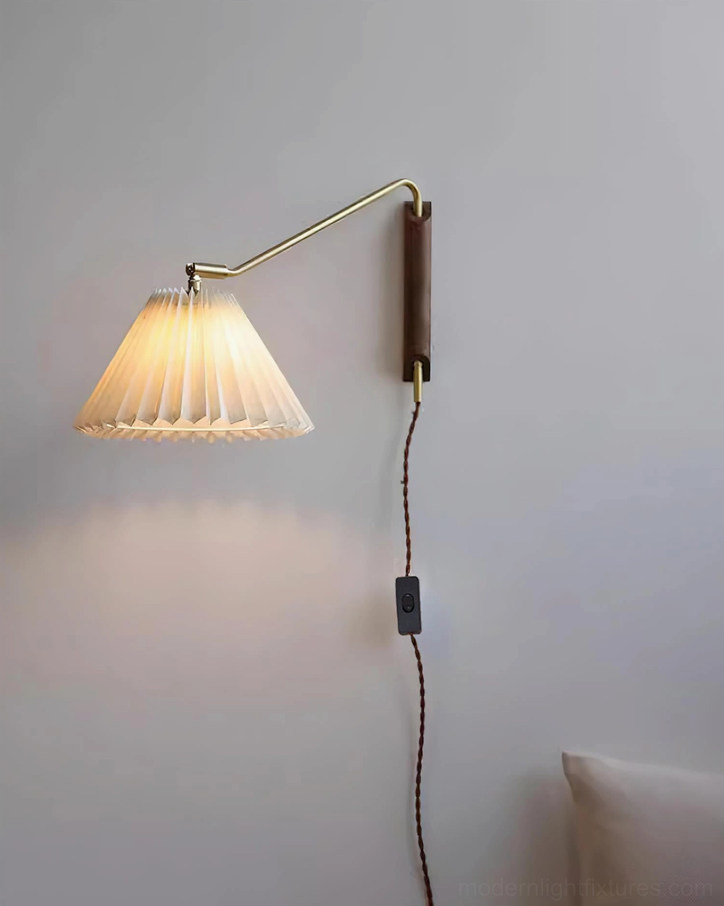 Dorset pleated wall lamp showing wooden base construction and brass hardware detail