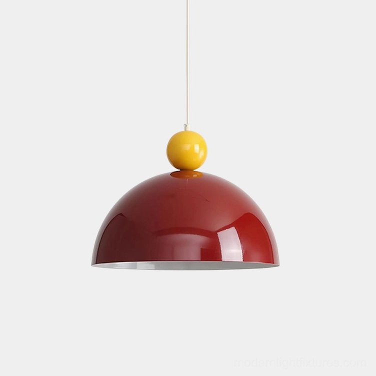Dotto burgundy pop-art dome pendant lamp with yellow spherical accent, front studio view showcasing bold color-blocking design