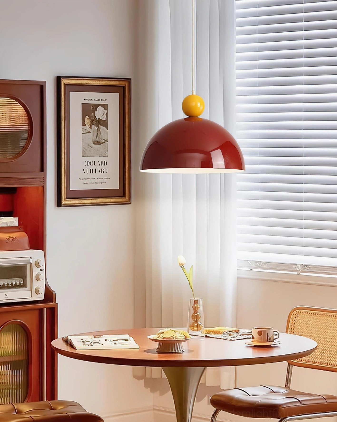 Dotto burgundy glossy dome pendant with yellow ball decoration, side view in vintage-style dining room with retro furniture