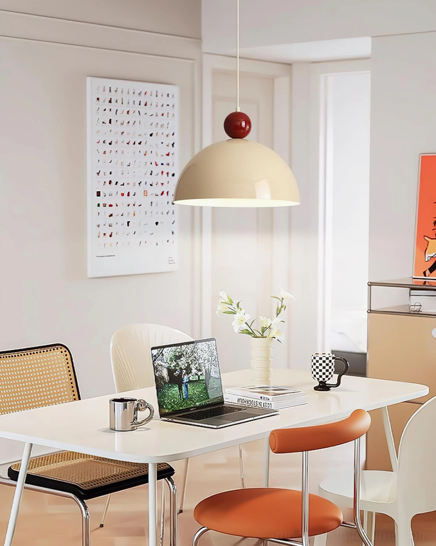 Dotto cream dome pendant light with red spherical accent, side view in warm minimalist home office and dining combination space