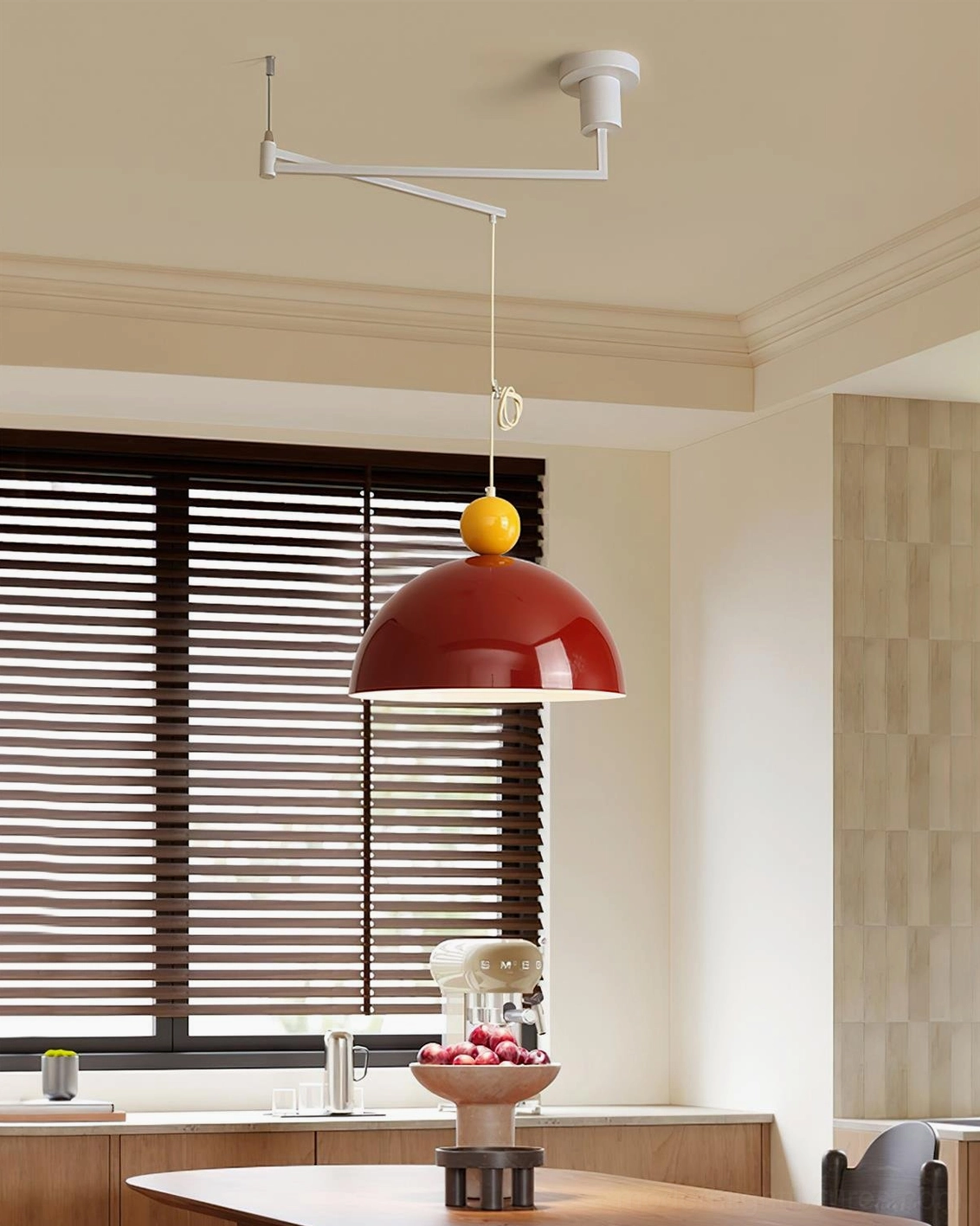 Contemporary swing arm pendant lamp with red shade and yellow top near window blinds dining area