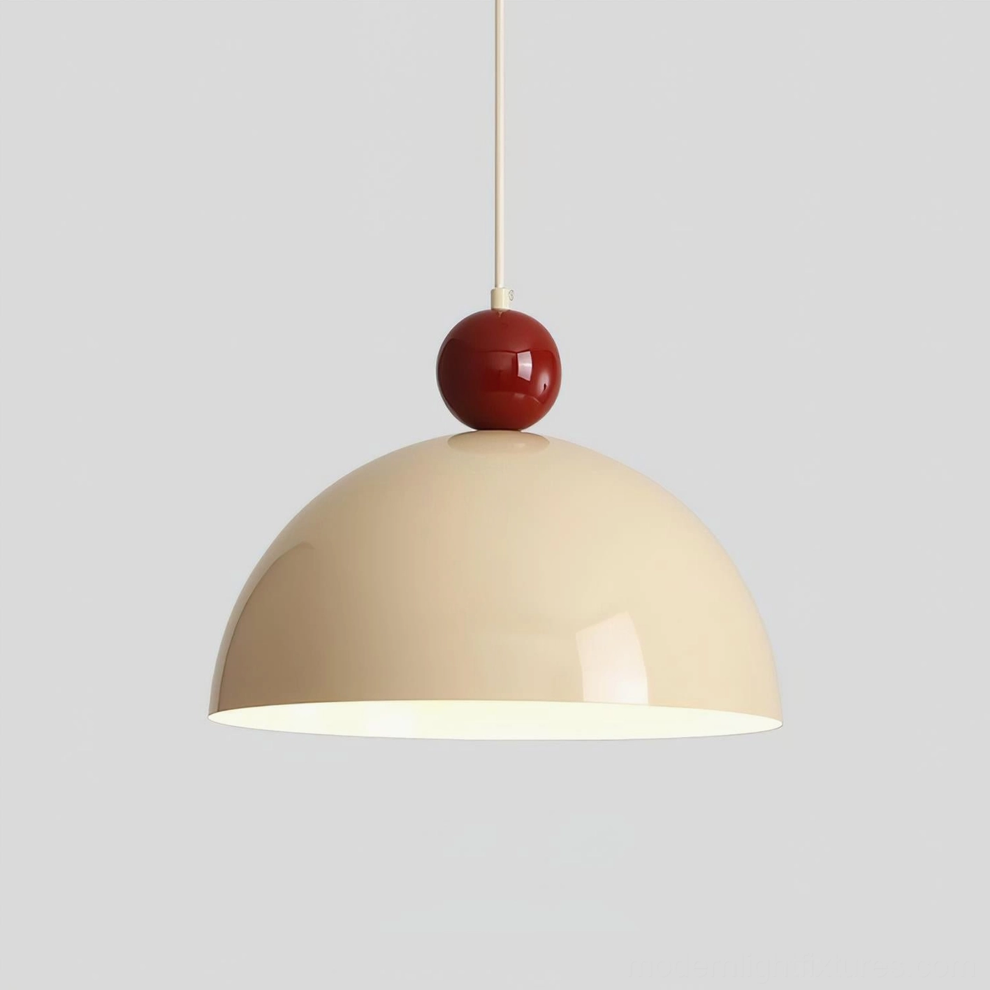 Dotto red and beige two-tone dome pendant light installed overhead, showing warm ambient lighting in contemporary interior space