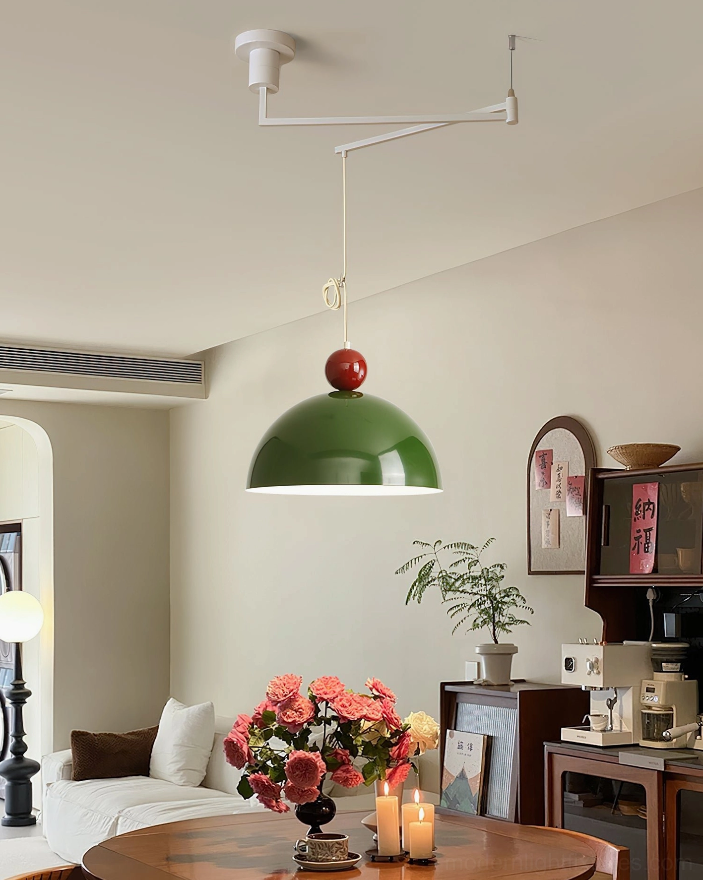 Red dome swing arm pendant light with yellow accent in modern kitchen-dining hybrid space