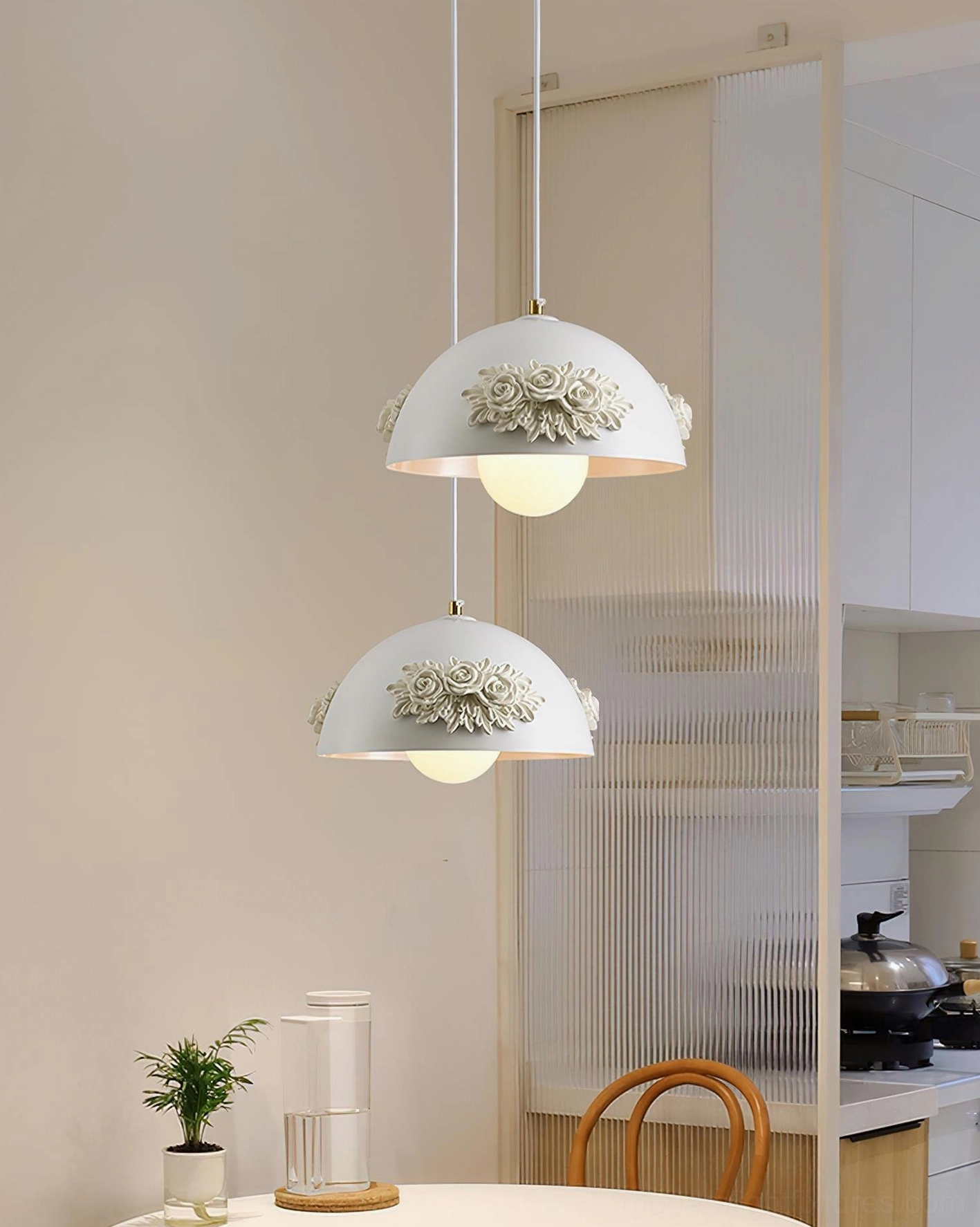 Dual stacked floral pendant lamps with 3D rose details, home dining area near kitchen partition, warm modern home lighting design