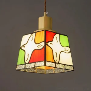 Colorful dove stained glass pendant lamp with brass canopy, close-up detail of full glass shade design