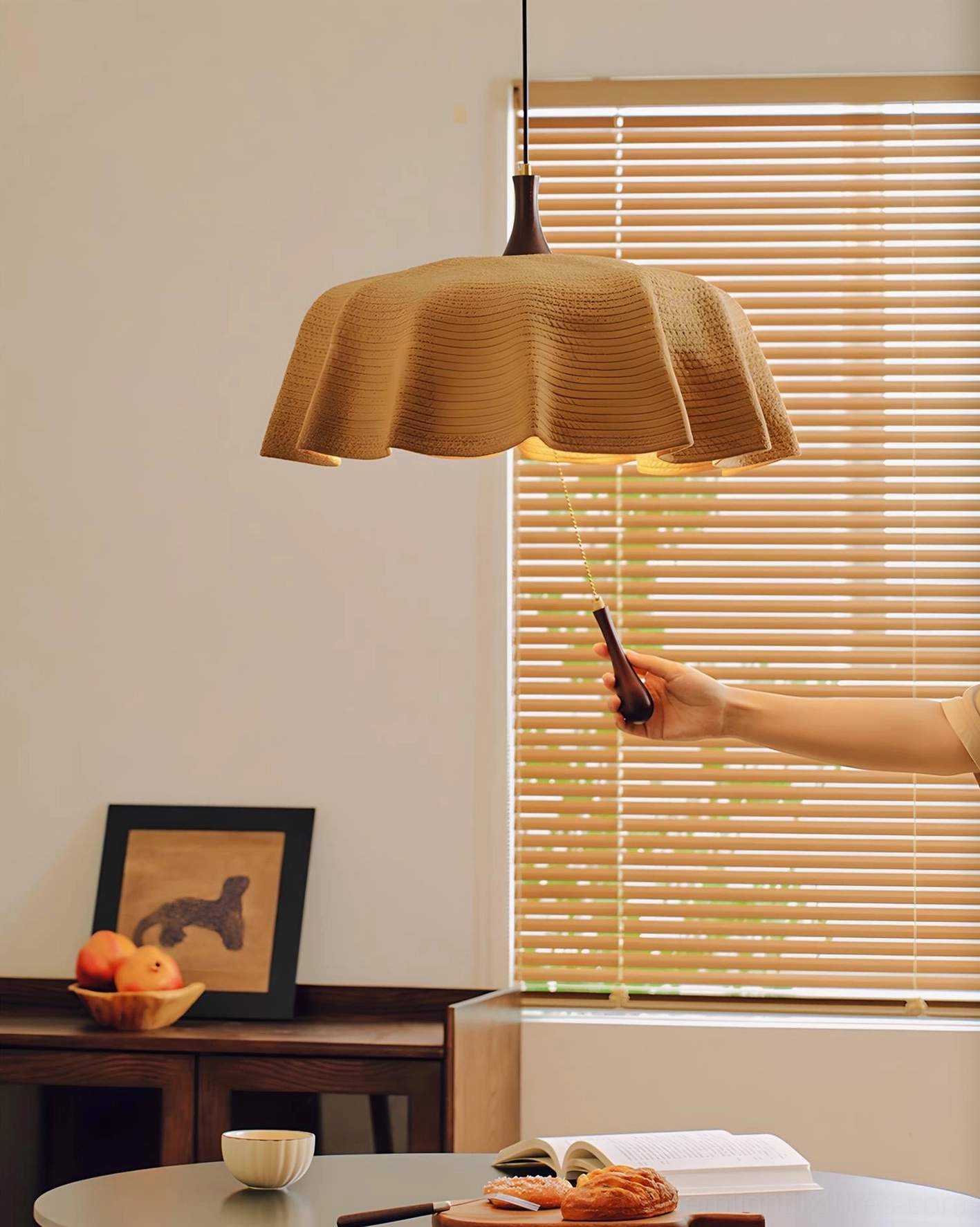 Drapelle textile pendant shade hanging in contemporary home with natural light ambiance