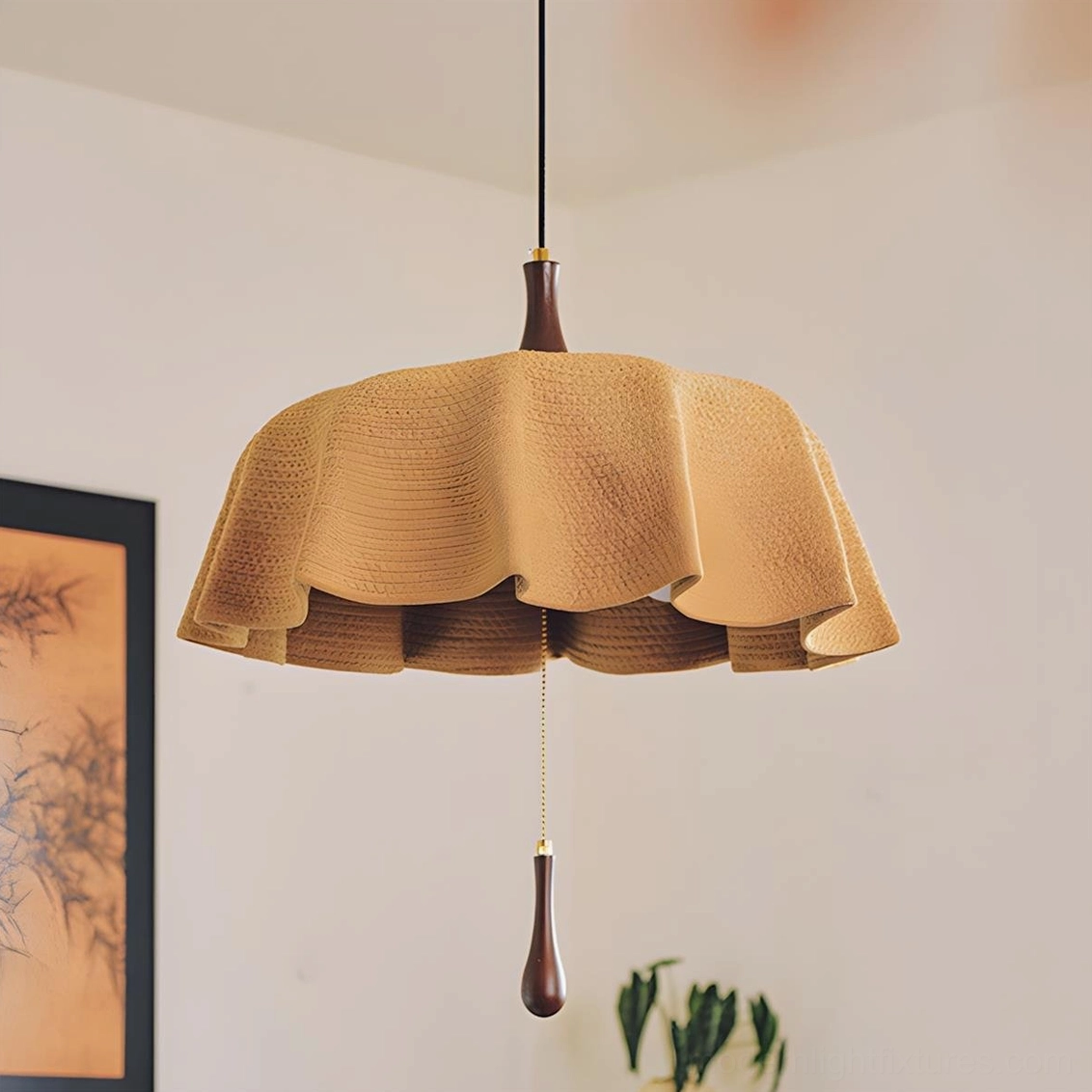Drapelle woven pendant lamp in walnut and light tan finish above dining furniture
