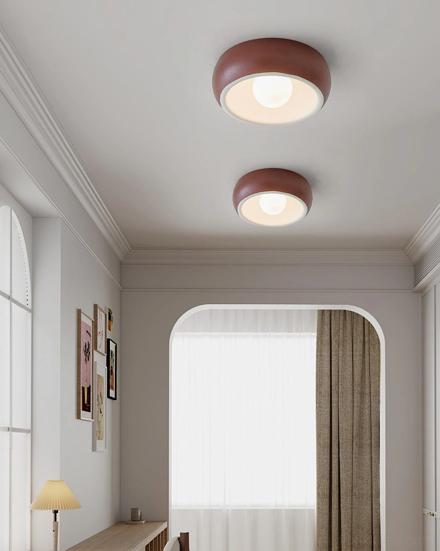 Pair of circular flush mount ceiling lights installed in residential hallway, demonstrating multiple fixture coordination