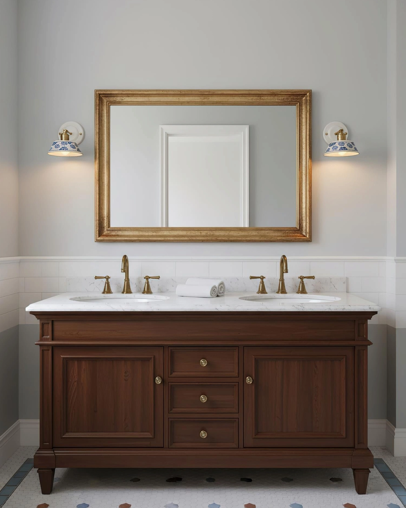 Pair of handcrafted indigo ceramic sconces flanking double bathroom vanity mirror