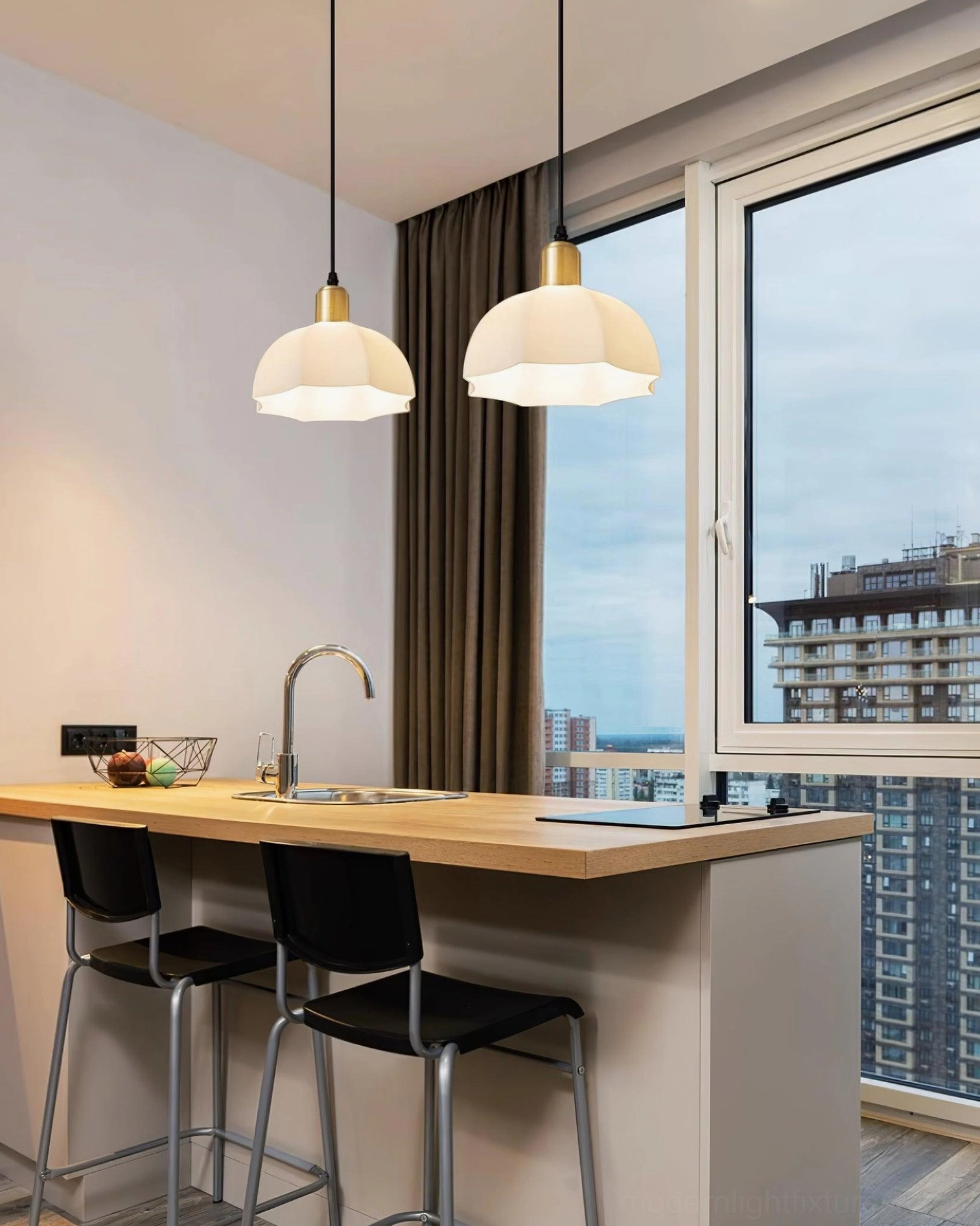 Dual horn scalloped pendant lights over kitchen island dining space Nordic minimalist interior