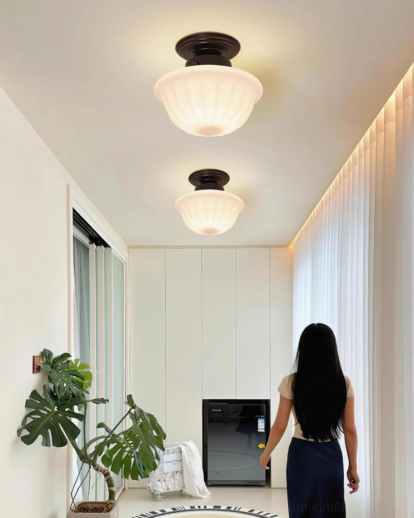 Pair of Ritten ceiling lights installed in residential hallway creating vintage farmhouse ambiance