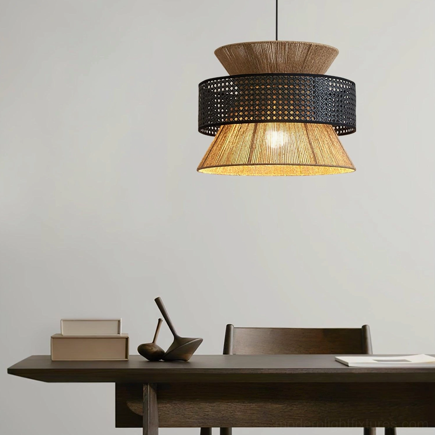 Dual-tone rattan pendant light featuring black woven upper shade and natural rattan lower shade