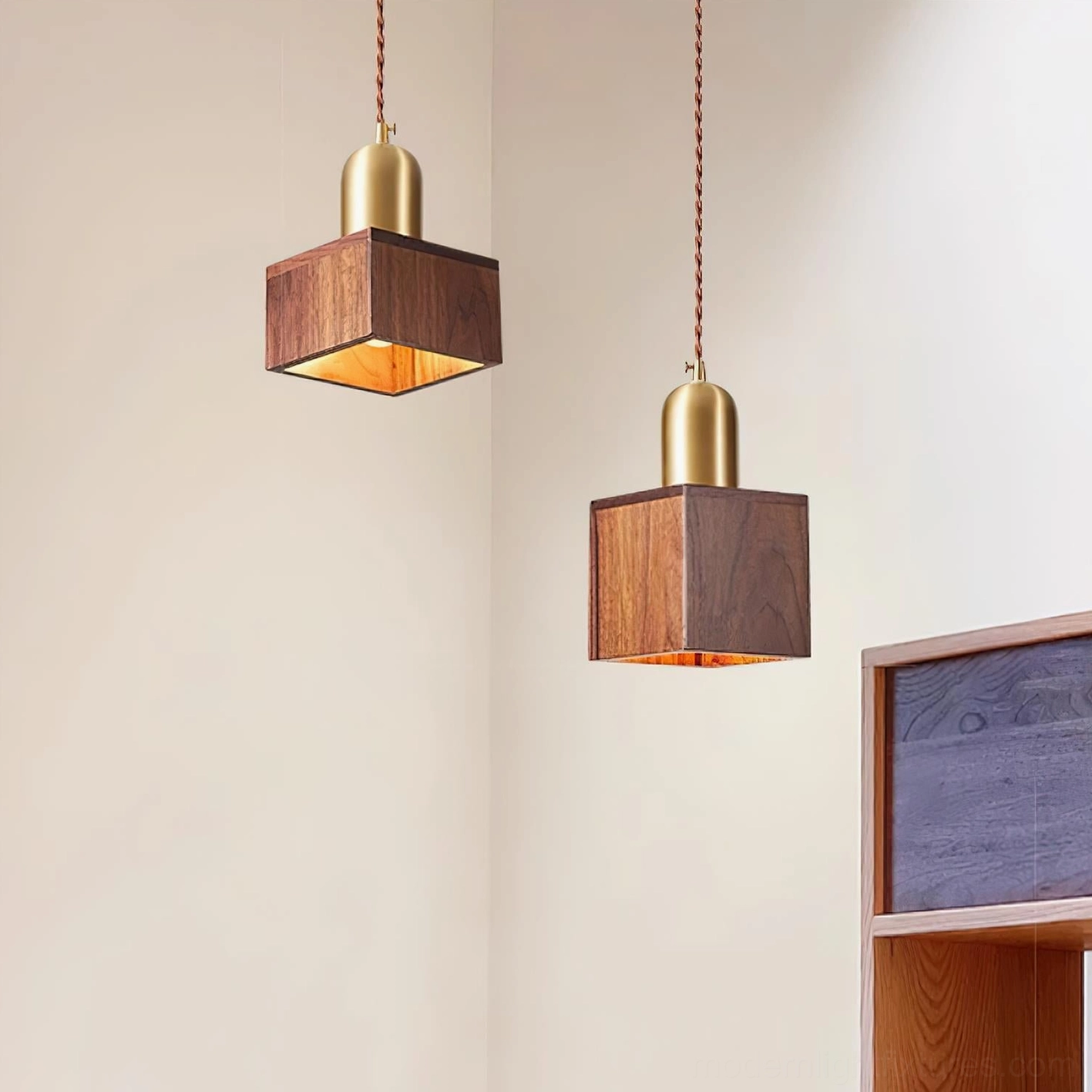 Dual walnut wood pendant lights in contemporary living room corner setting
