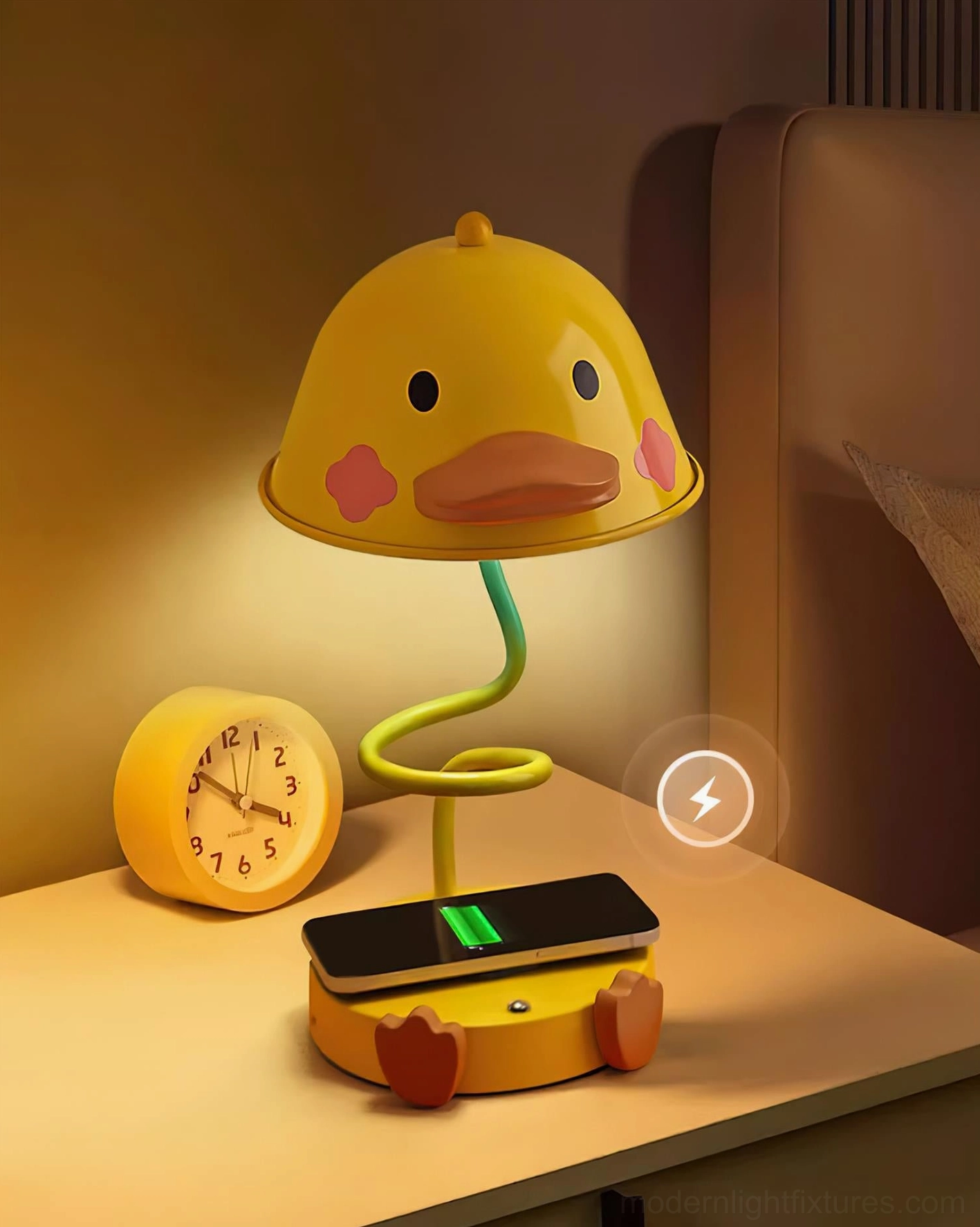 Playful duck-shaped LED lamp with wireless charging on bedroom nightstand with alarm clock