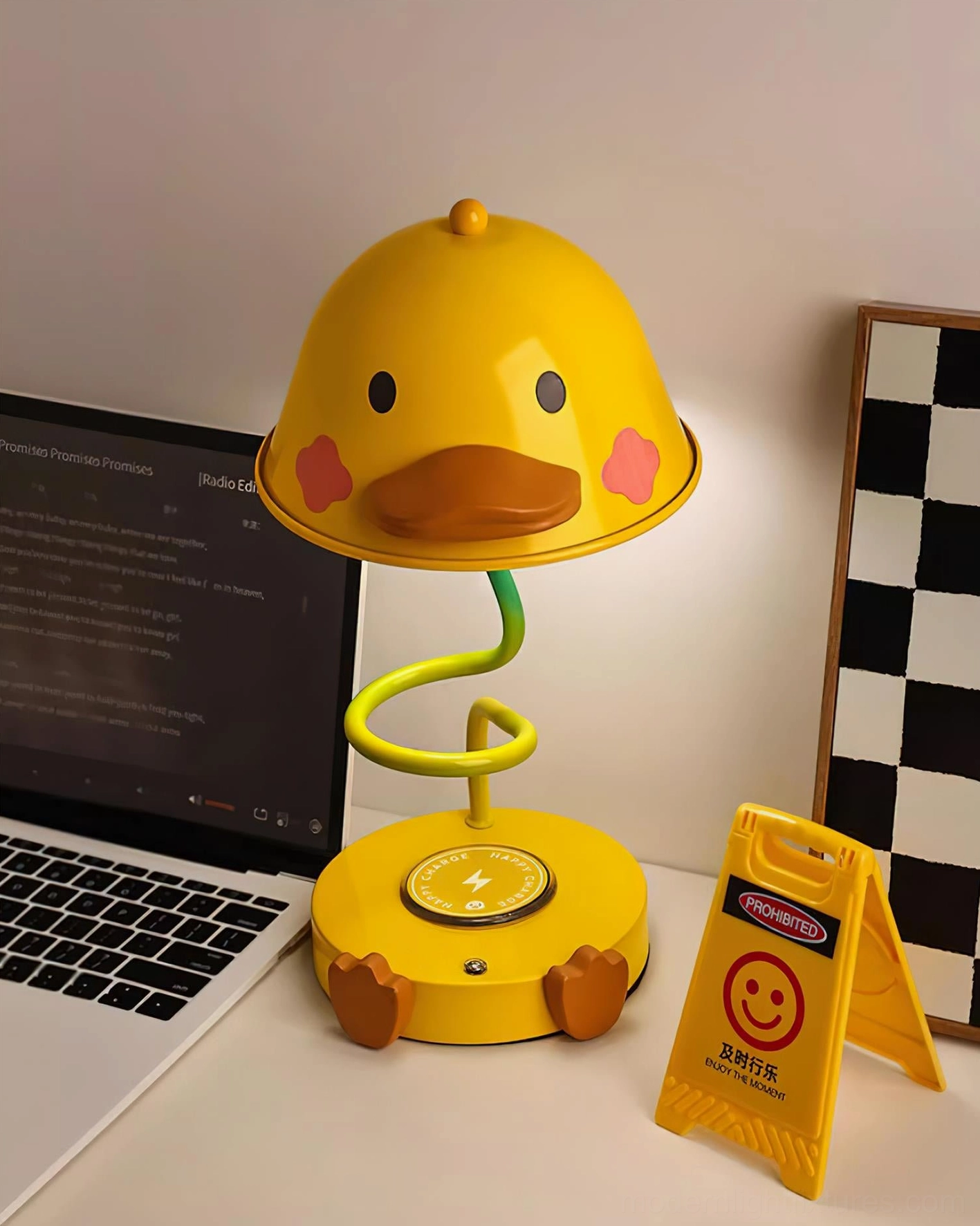 Modern duck desk lamp with integrated LED lighting on home office desk with laptop and minimalist decor