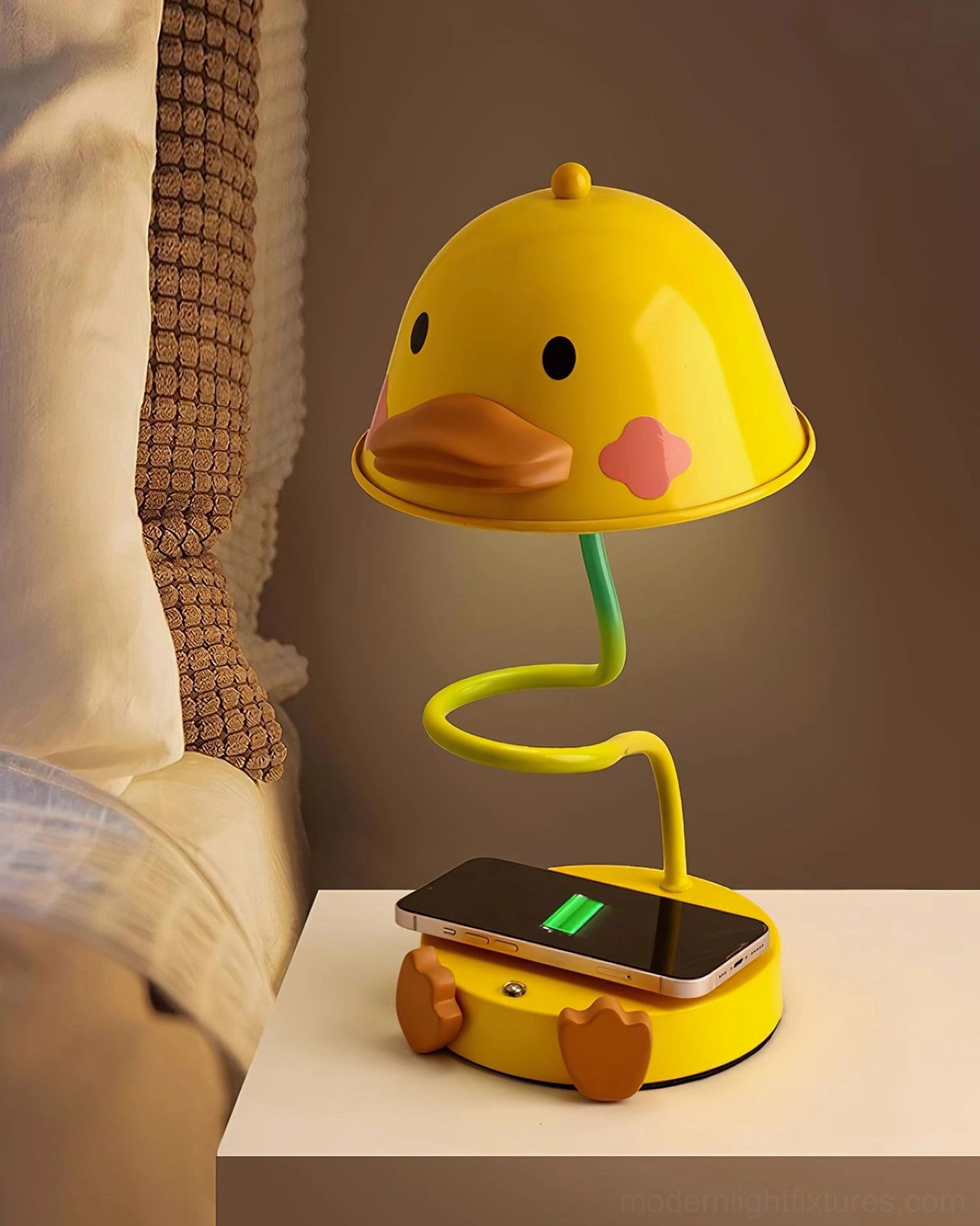 Duck wireless charging table lamp showing base charging functionality for Qi-enabled devices