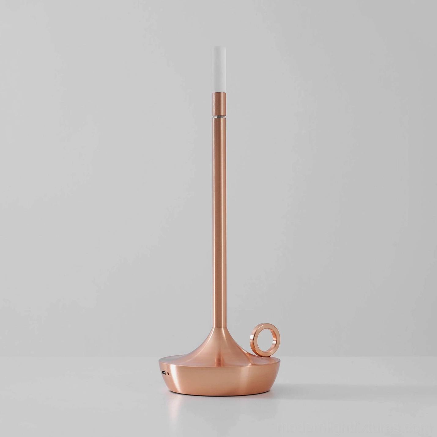 Modern LED candle table lamp with durable aluminum construction lasting through years of daily use