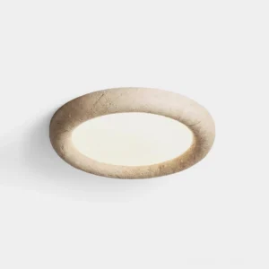 Earthbound travertine ceiling lamp overhead studio view showing round minimalist flush mount fixture with textured stone surface and frosted diffuser