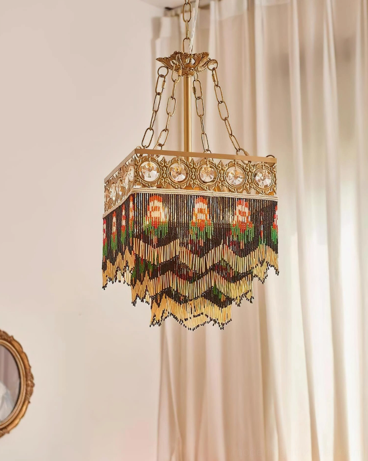 Eclectic bohemian pendant chandelier with layered beaded tassels and embroidered patterns