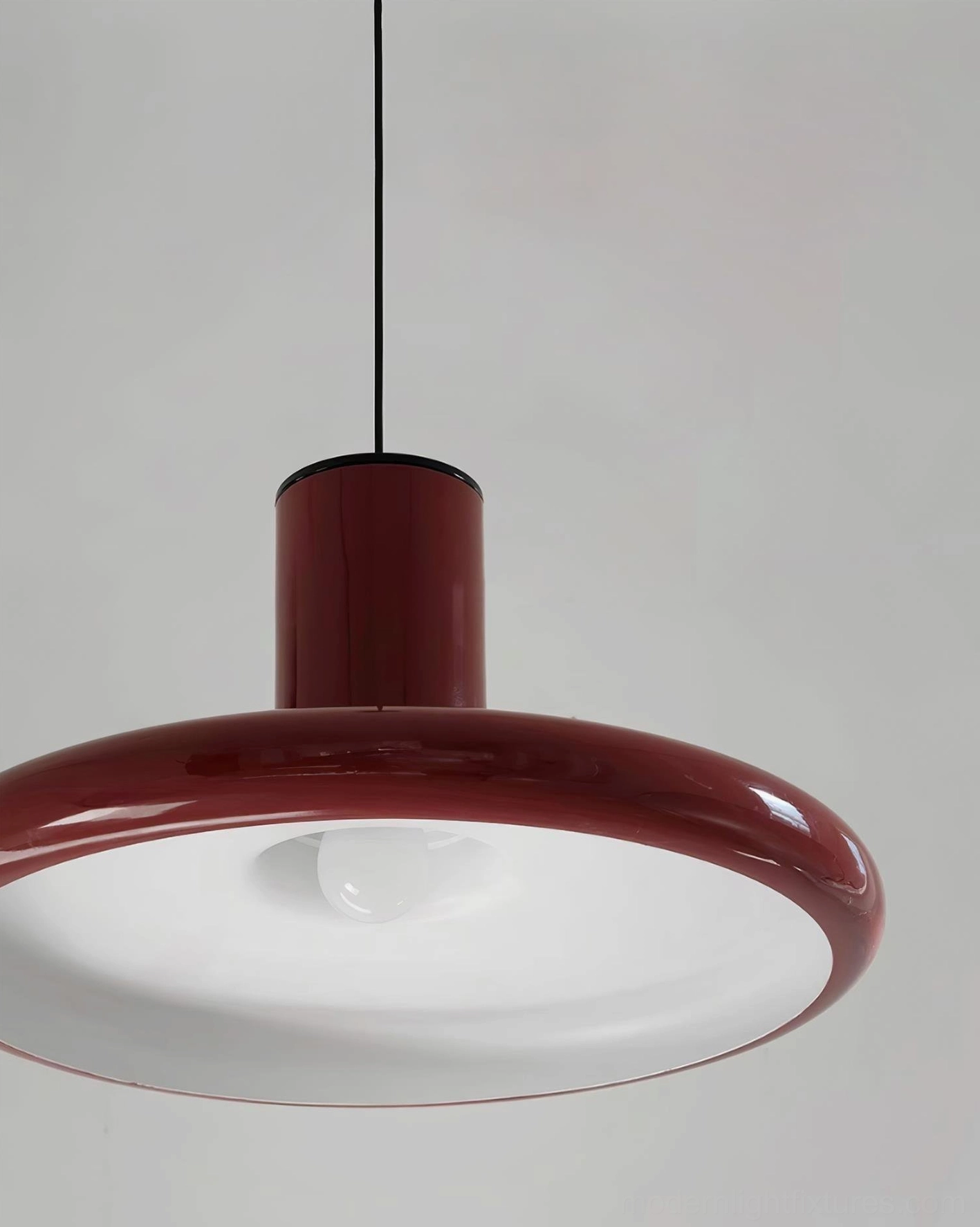 Red glossy disc pendant light eclectic bohemian interior mixed vintage elements