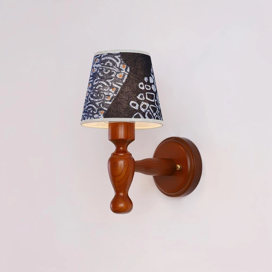 Modern wall sconce with artistic printed shade, eclectic interior accent