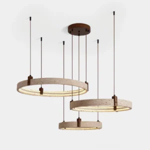 Eclora three-ring travertine chandelier pendant light with warm LED display on white background