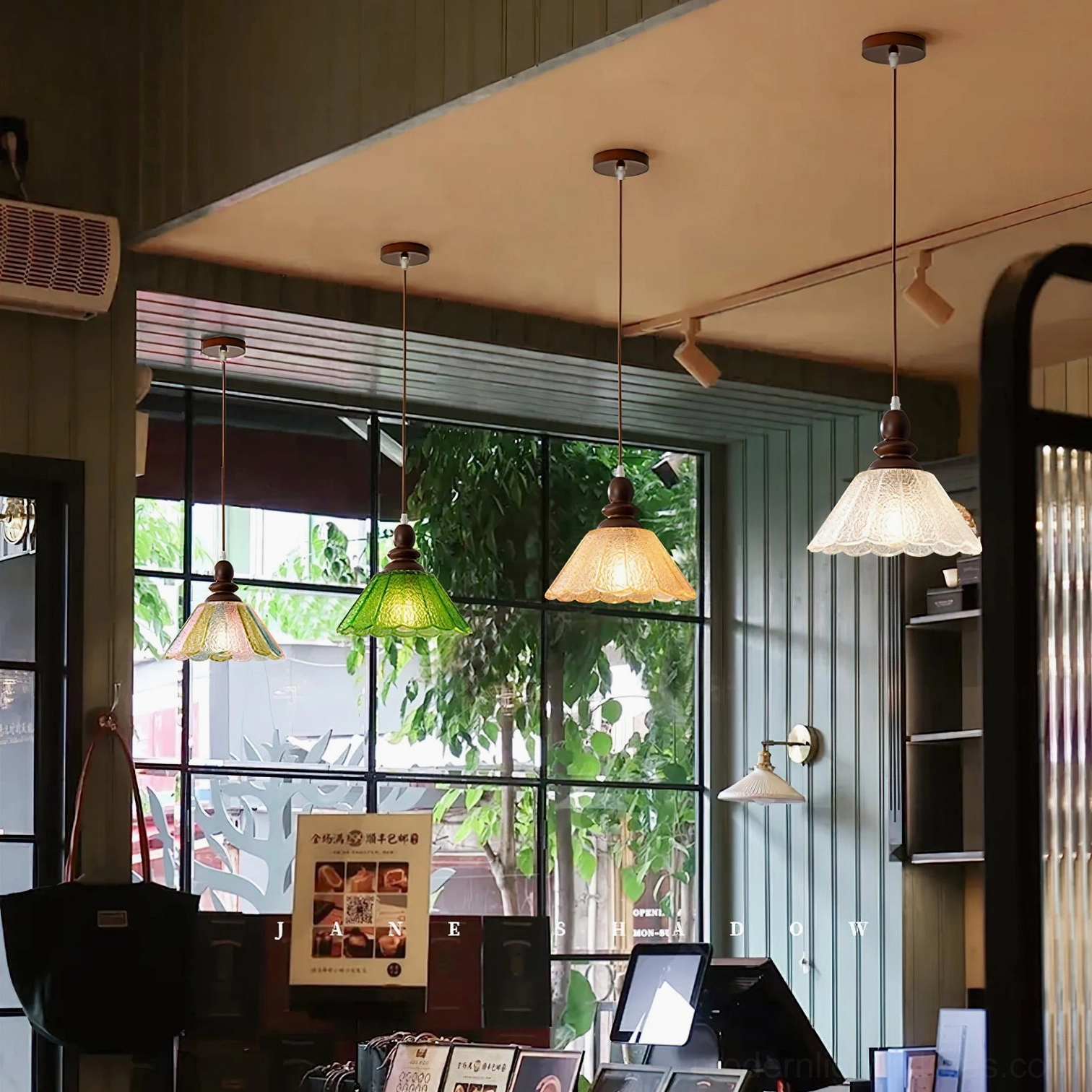 Elara scalloped pendant lights in café restaurant setting, warm vintage commercial lighting decor