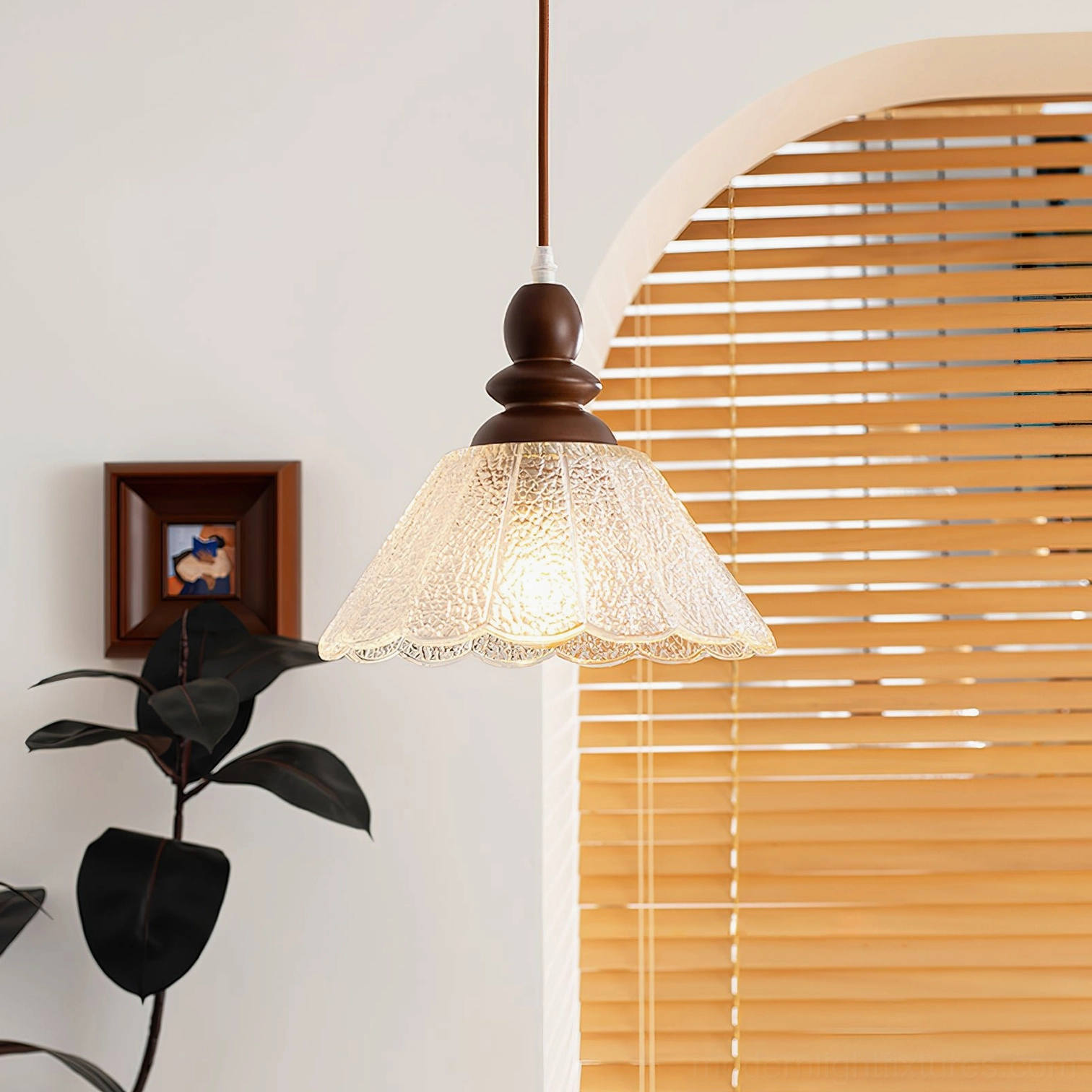 Elara off-white frosted scalloped pendant light in cozy residential living room corner, vintage home ambiance