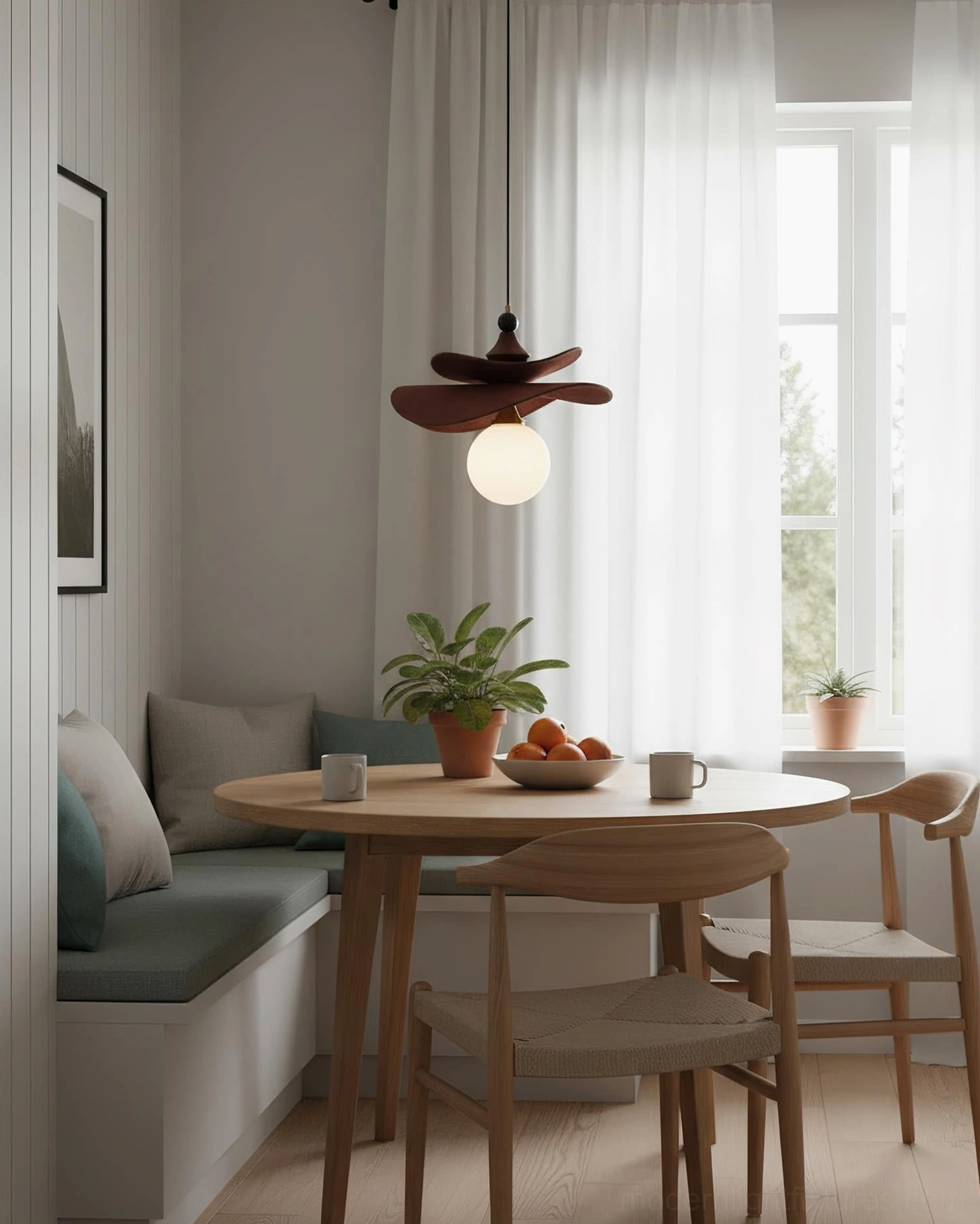Elaren pendant light side view, compact size, modern apartment dining nook, natural daylight