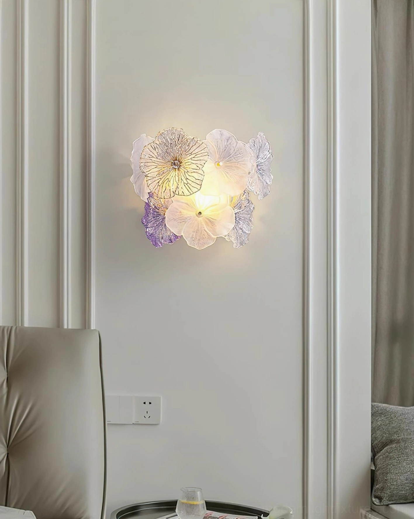 Elaria gold colored floral glass wall sconce warm metallic botanical accents