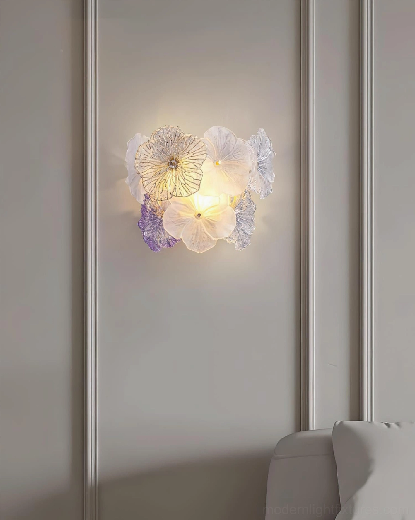 Elaria floral glass wall sconce mounted on luxury wainscoted wall with elegant soft warm ambient lighting