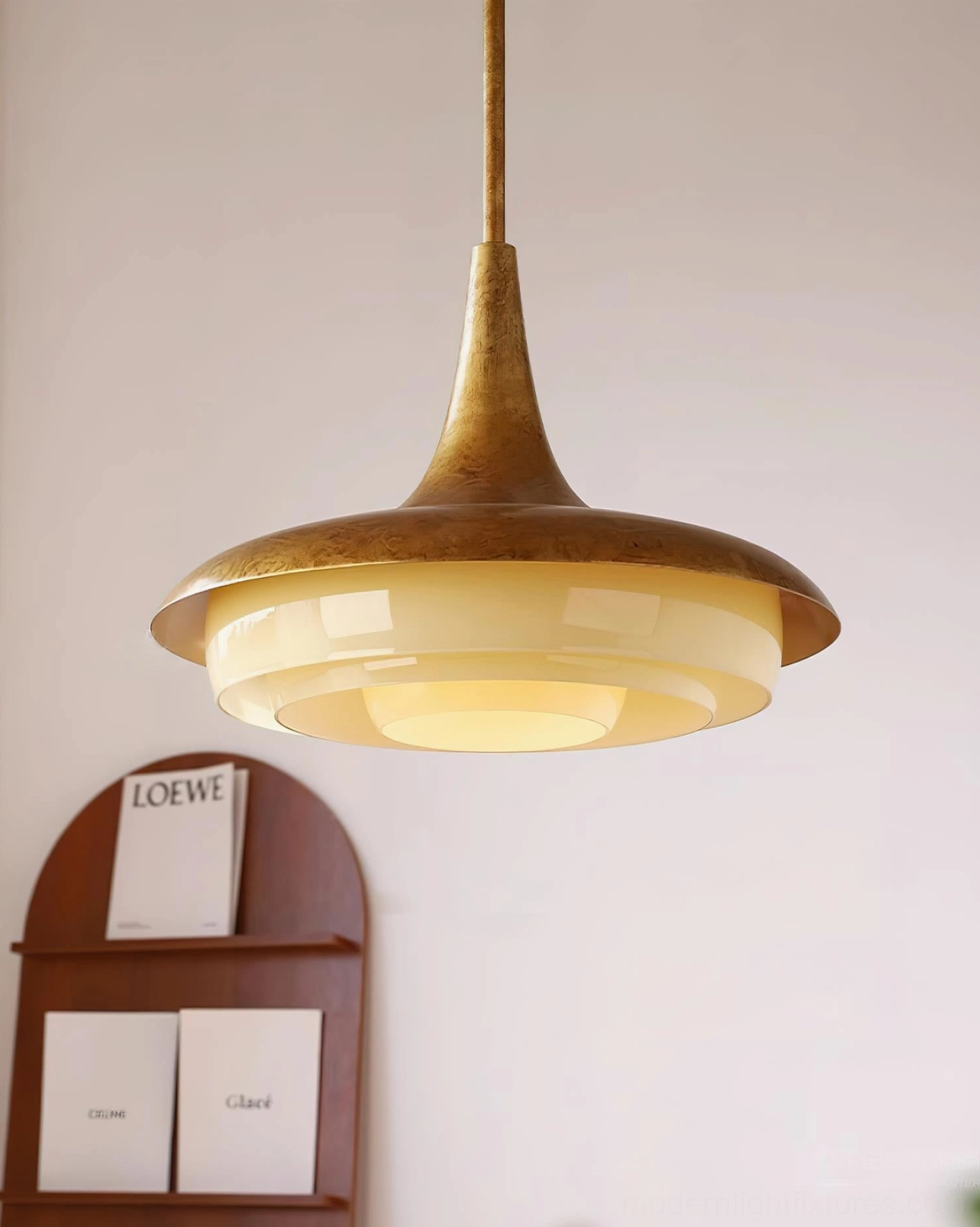 Elegant brass pendant lamp with frosted glass shade, installation example in contemporary interior