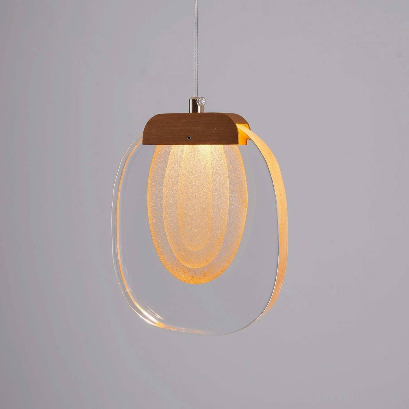 Elegant glass ripples pendant fixture in modern minimalist dining or living space