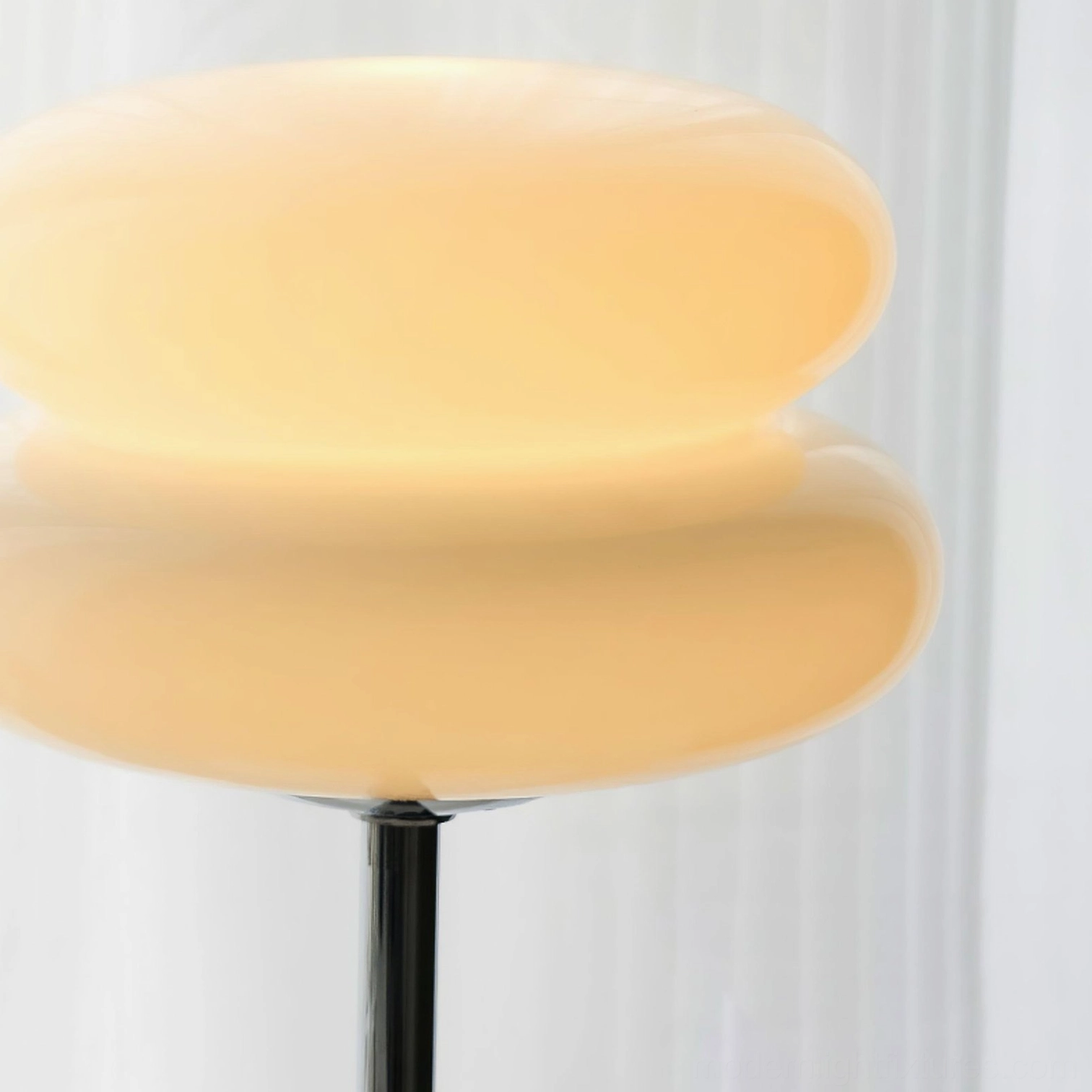 Glass table lamp with elegant proportional design creating sophisticated home ambiance