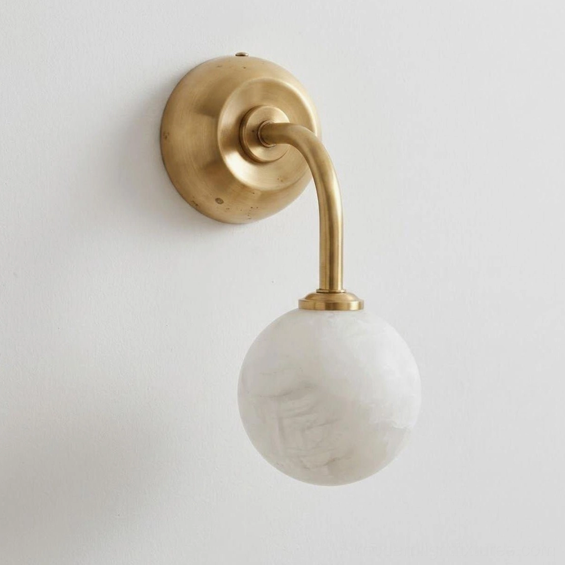Elio alabaster wall sconce with W 16cm projection H 23cm dimensions in warm brass and white stone