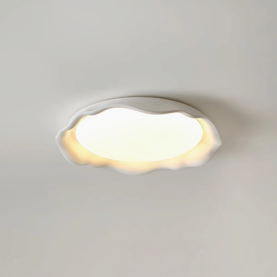 Elio scalloped LED ceiling light white matte finish, soft wavy edge rim, warm ambient light diffusion, side-front ceiling view
