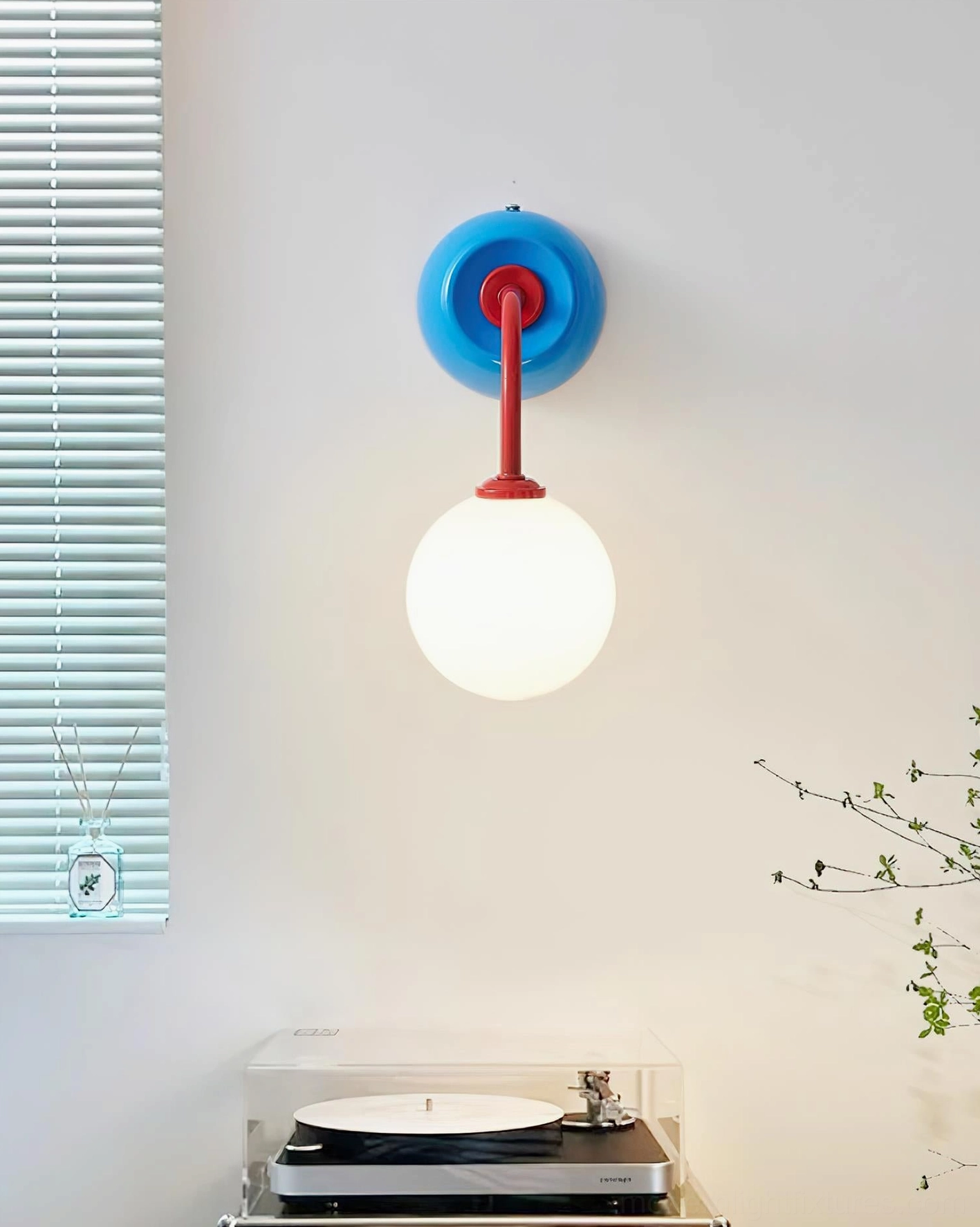 Elio retro globe wall sconce showing authentic mid-century modern design aesthetic