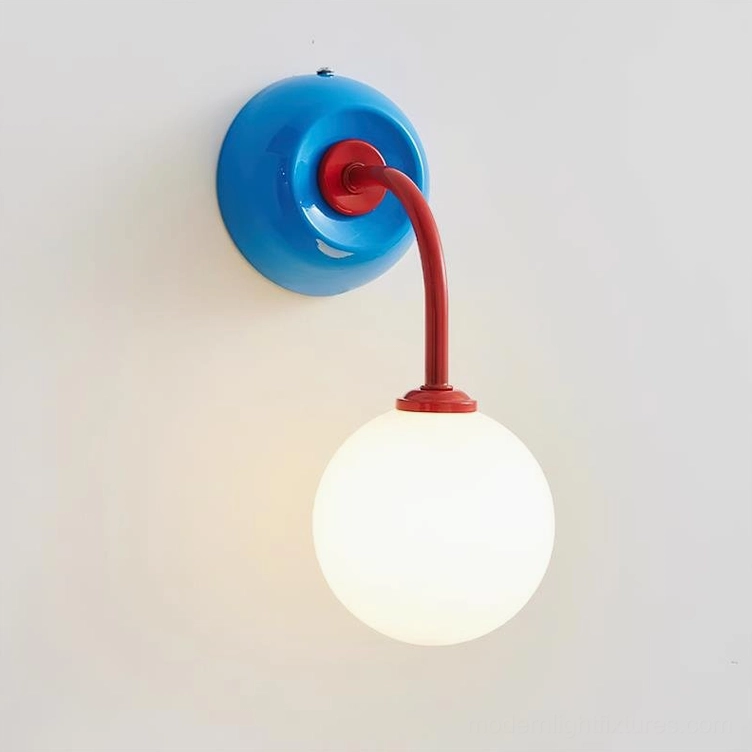 Elio wall sconce blue base with red curved arm variant showing color-blocking design