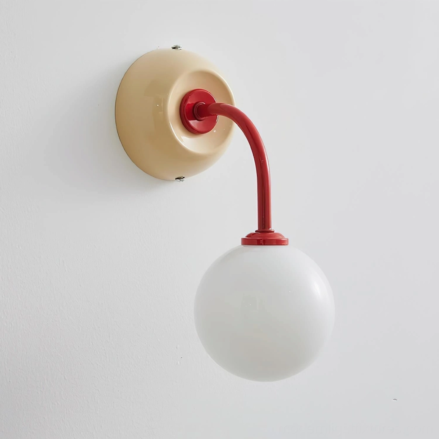 Elio wall sconce ambient lighting in living space with warm diffused glow atmosphere