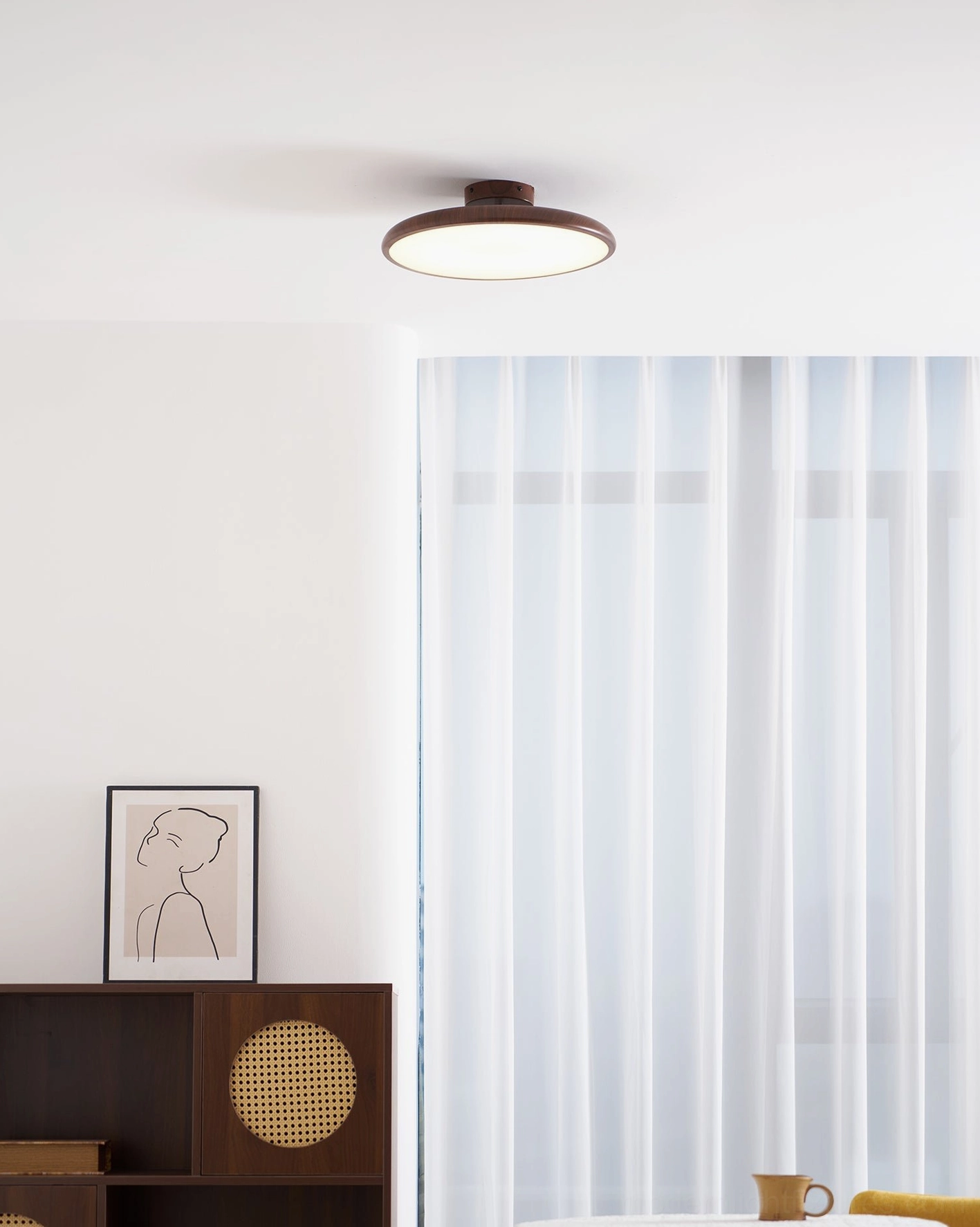 Compact Ellos 40cm ceiling light in residential dining area
